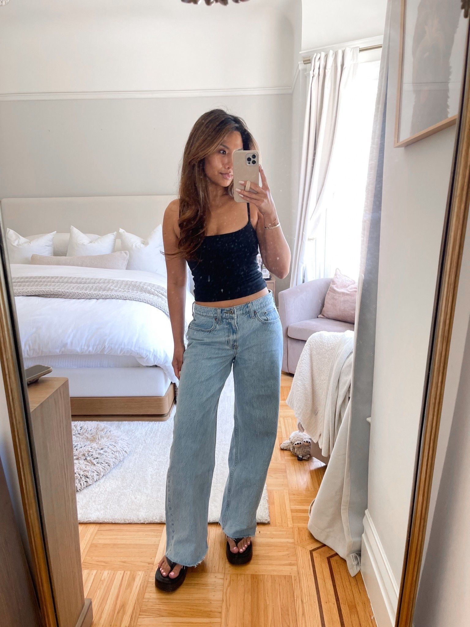 If you missed out on the Hailey Bieber gap jeans this morning - don’t worry bc these are my fav low rise baggy jeans AND they come in petite 🤏🏼 

Sizing:
Bra free cami - tts, xs
Jeans - tts, 25 short in light wash raw hem 
Platform flip flops - tts

#LTKPetite #LTKootd