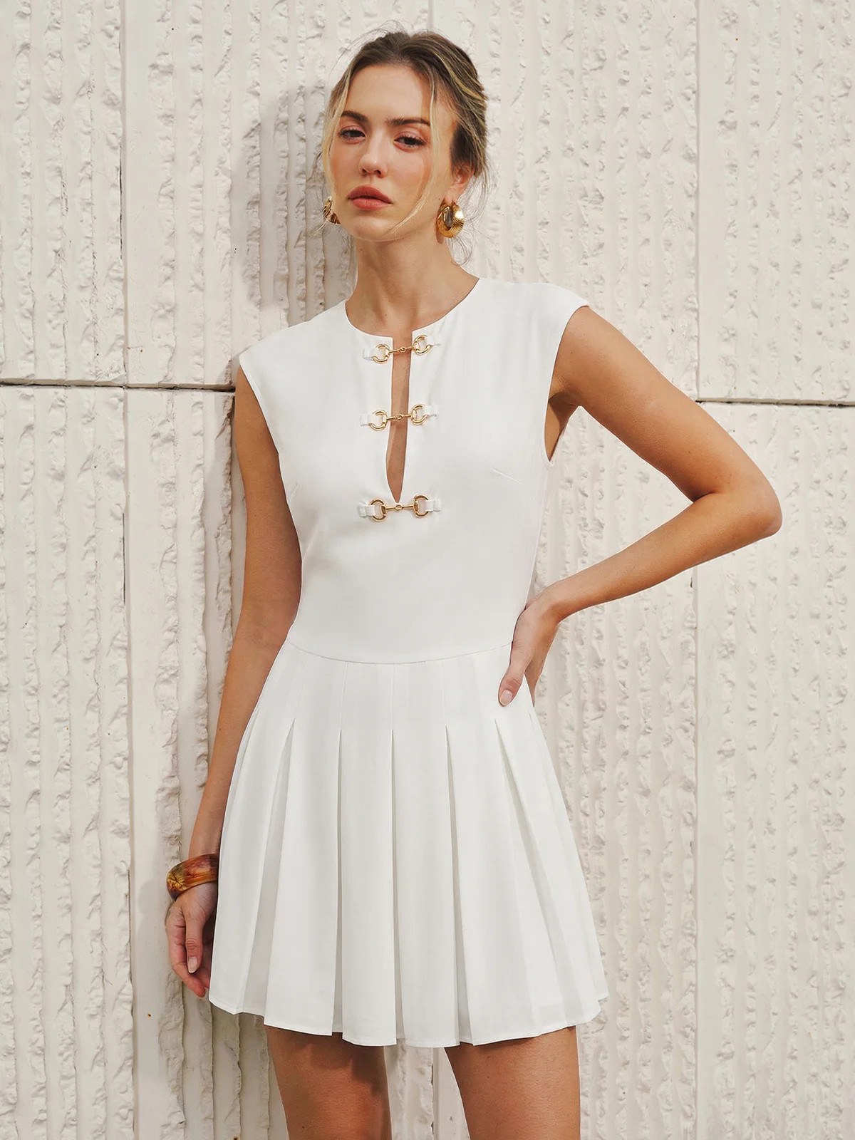 Sleeveless Horsebit Pleated Mini Dress | Commense