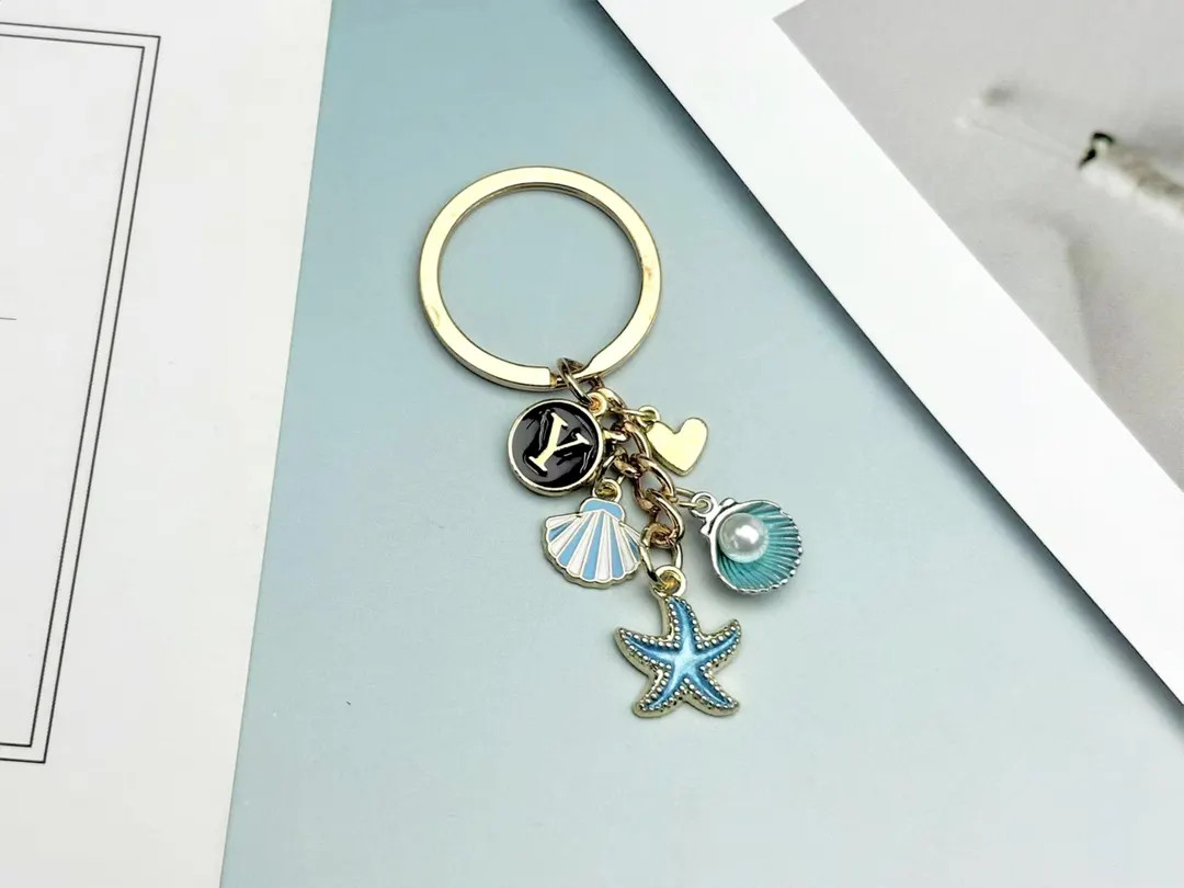 Personalized Ocean Keychain with Starfish, Shell and Pearl Charm, Custom Beach-themed Wallet Char... | Etsy (US)