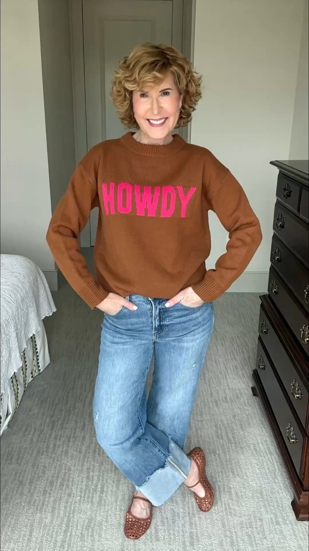 This brown and pink HOWDY statement sweater is such a cute fall find! The relaxed-fit crewneck knit has drop shoulders, long sleeves, and ribbed trim, and I paired it with cuffed straight-leg jeans and brown woven Mary Jane flats for an easy casual fall outfit. Fits TTS, and I’m wearing my normal size XS. Use code SUZY15 for 15% off on top of the sale price!

#LTKootd #LTKOver40 #LTKgrwm