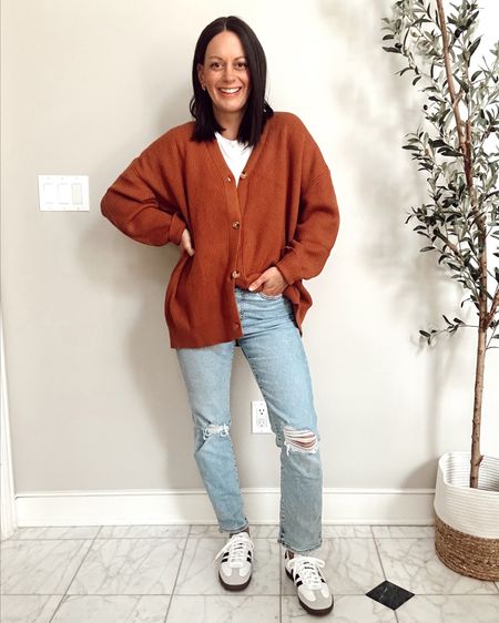 Cozy cardigan sweater for fall or winter - runs true to size to big.  Paired with straight leg jeans, white tee and adidas sneakers.



#LTKstyletip #LTKfindsunder50 #LTKover40