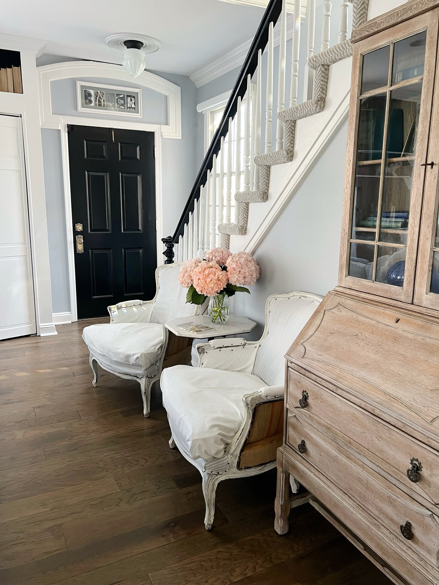 Rejuvenation lighting and entryway details.

#hardware #rejuvenation #entryway #blackandwhite #classichomedecor 

#LTKSeasonal #LTKfindsunder50 #LTKhome