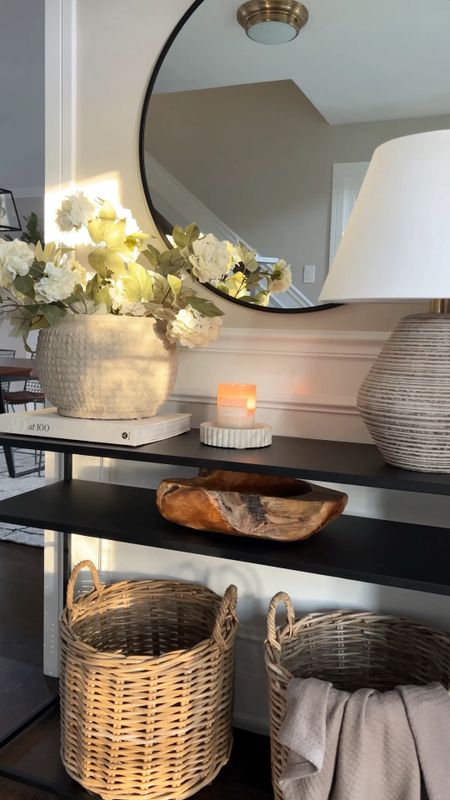 Using my favorite faux hydrangeas on our console table in our foyer for a welcoming spring feel. The cream hydrangeas are in stock! I used 4 stems here. 
Entryway decor. Foyer decor. Console table styling. Black console table. Look for less. Affordable decor  

#LTKhome #LTKsalealert #LTKSeasonal