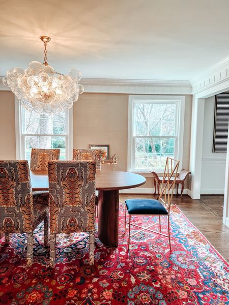 Dining room table + chandelier 

Rug is vintage and chairs are custom  

#LTKhome