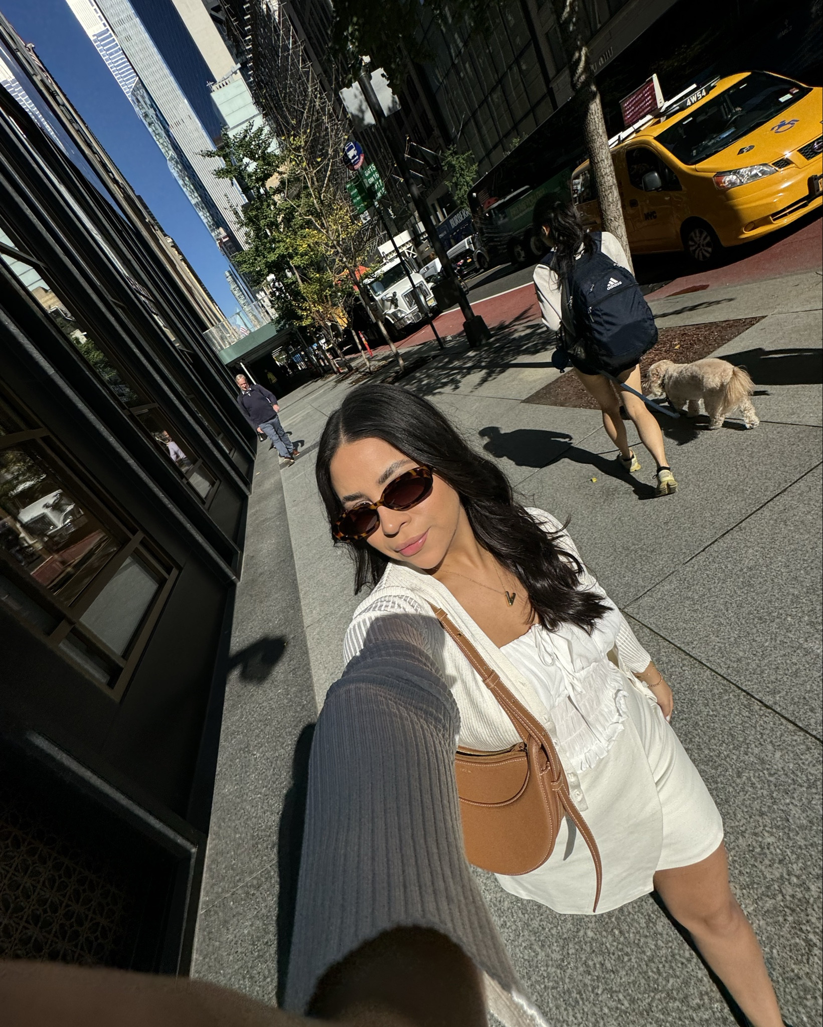 NYC shopping outfit idea 
White ruffle tank: small 
White cardigan: xs 
White wrap skort: xs 
Polene inspired bag 
90s tortoise sunglasses 
Gold bubble initial necklace 

#LTKFindsUnder100 #LTKStyleTip #LTKNYFW