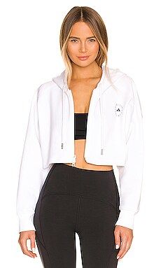 adidas by Stella McCartney Cropped Hoodie in White from Revolve.com | Revolve Clothing (Global)