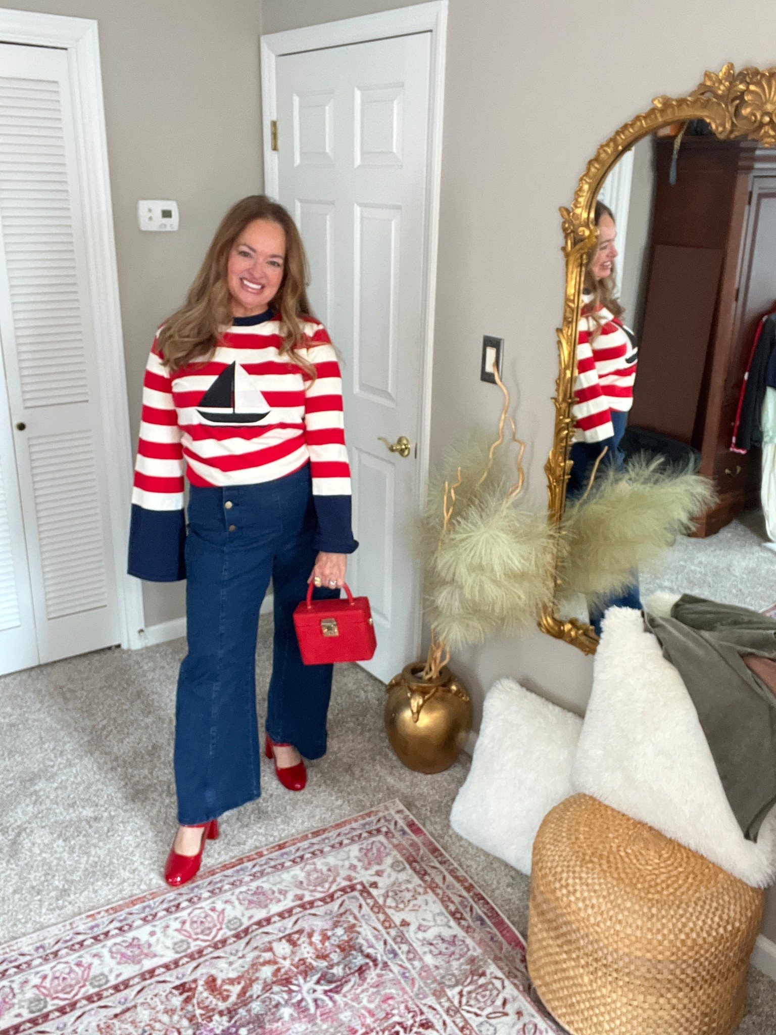 Adorable striped sailboat motif knit sweater. Paired with sailor denim pants. Spring forward indeed. 

#LTKdayinmylife #LTKWorkwear #LTKootd