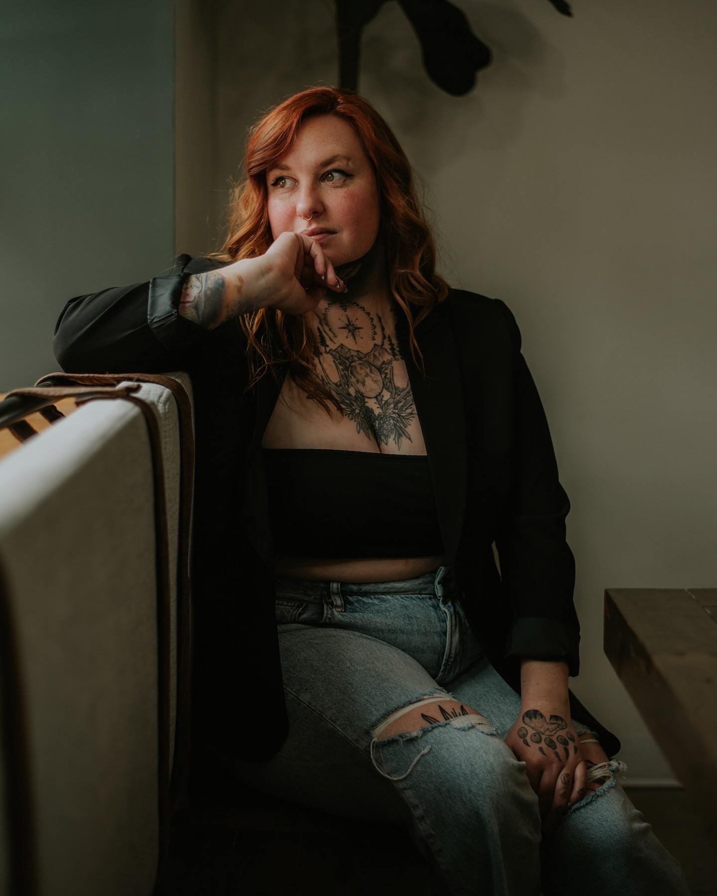 At 12, I was hauling toolboxes up narrow staircases, cutting copper pipes and threaded rod, and cleaning out fittings with a metal brush on a drill to get them shiny and ready for my dad to solder. I was the designated helper, and he didn’t go easy on me. Now I’m designing dream homes while my toddlers crash toy trucks into my material samples. This wasn’t exactly the plan—but I’m glad it’s where I ended up.

Growing up working with my dad taught me to pay attention to the details and take pride in doing things right the first time. I went on to earn a B.S. in Mechanical Engineering, which gave me the technical foundation I still lean on today. But it wasn’t until 2020, when I left my government job and took a leap to build something of my own, that I really found my lane.

Now, I run Houseal Construction with my husband, Kyle. I handle design, marketing, and the million little things that keep our business running—while raising our three kids: Evan, Hazel, and Gryffin. Yep, they all share one bedroom in our 1400-square-foot house… for now. That firsthand experience of squeezing the most out of small spaces has majorly influenced the way I design—and honestly, it’s one of the reasons this brand exists.

I care about creating spaces that work. That feel good, look good, and actually make your life easier. When you’re juggling kids, clients, job sites, and the occasional baby strapped to your hip while vacuuming drywall dust with the shop vac… you learn fast that every square inch matters.

Some days I’m sketching tile layouts with a baby drooling on my notebook. Other days I’m picking up vanities, hauling samples, or trying to keep the dogs from stepping in wet paint.

My dream? To keep pushing the boundaries of what functional, beautiful design can look like—through Houseal Construction, Bienvenue & Co, and whatever comes next. These brands are all tied together by a simple goal: helping people live better in the spaces they already call home.

Here I share my passion for design, and the beautiful, messy, everyday reality of building a business and raising a family at the same time.

Welcome. I’m so glad you’re here. ✨