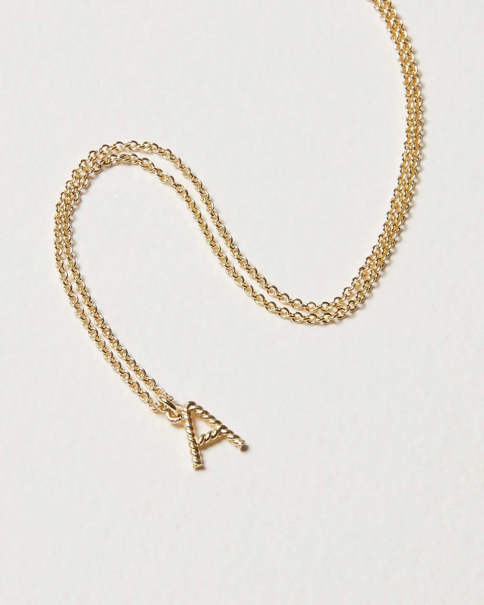 Alphabet Twisted Initial Gold Plated Pendant Necklace | Oliver Bonas | Oliver Bonas (Global)
