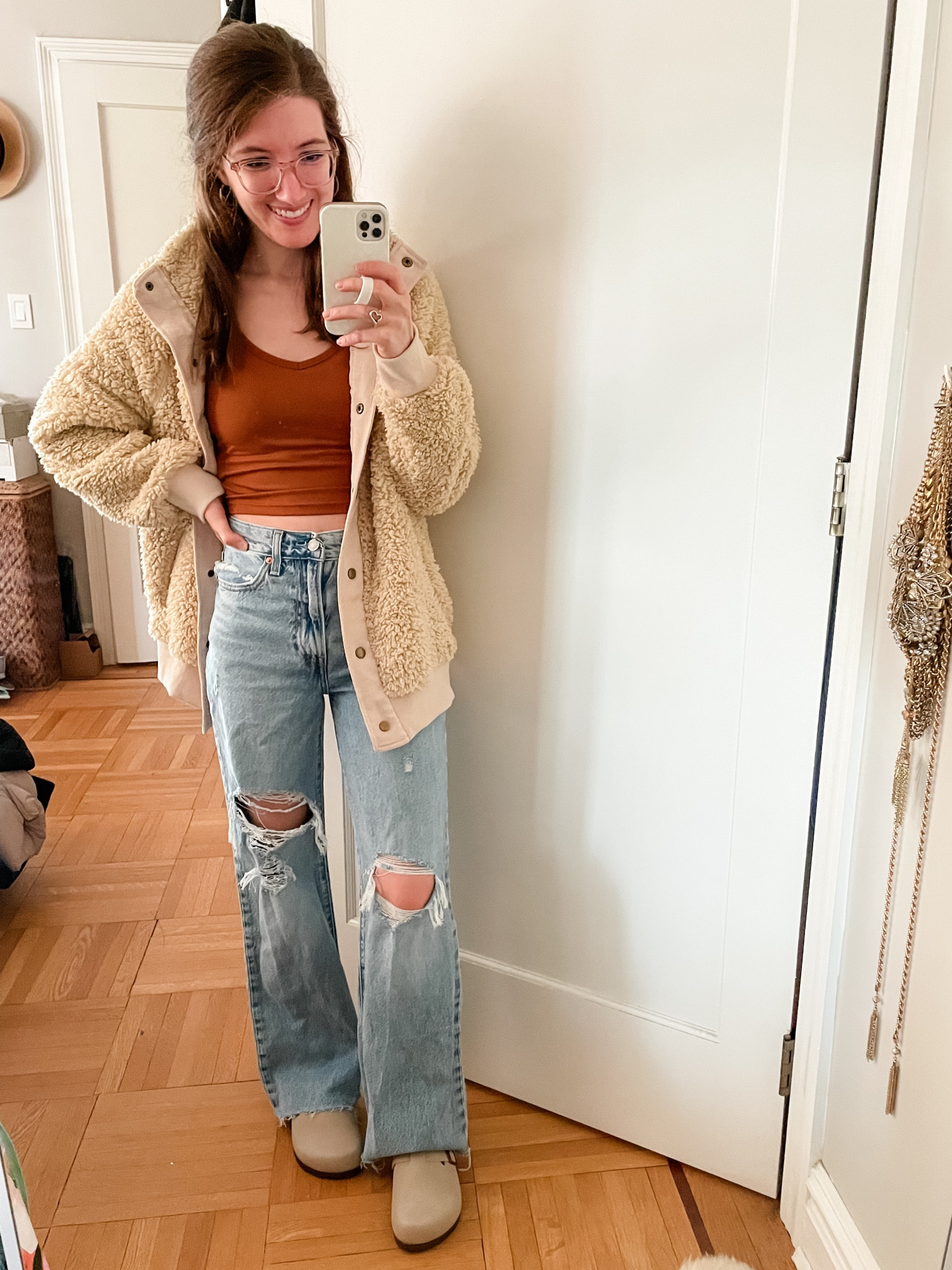 Fleece Teddy jacket: TTS
Cropped Tank: TTS
Distressed wide leg jeans: TTS, I cut the length about an inch
Birkenstock Boston clogs look for less: TTS

#LTKsalealert #LTKtravel #LTKstyletip