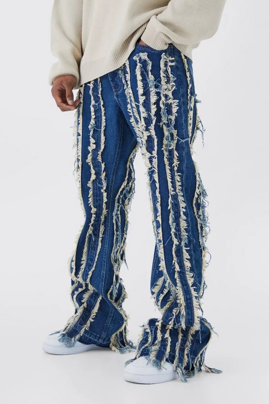 Relaxed Flare Frayed Edge Jeans | boohooMAN (US & Canada)