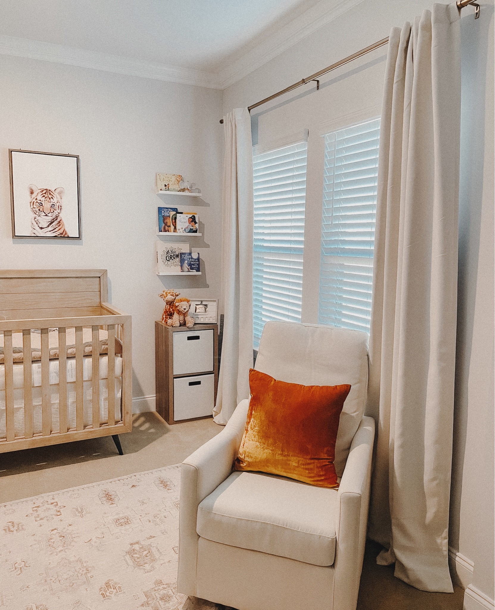 Loving how the baby’s nursery is turning out…simple and neutral to match our space! ☺️💙

#nursery #curtains #drapes #glider #rocker #nurseryfurniture #cubeorganizer #organizer 

#LTKbaby #LTKunder50 #LTKhome