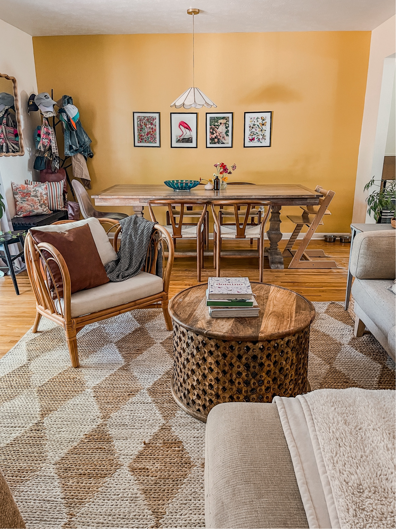 The view of our living room and dining room is my favorite! I love the wishbone style dining chairs. The diamond jute rug is so fun. I love this rattan chair from urban outfitters! 

#LTKSeasonal #LTKHome #LTKStyleTip