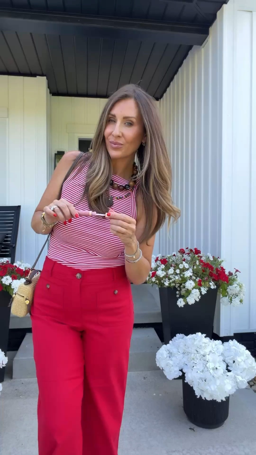 This red striped tank and cropped pants combo is such a fun summer statement look. The shell necklace and woven bag add the perfect coastal touch for vacations, dinners, and warm weather events.

summer outfit, red pants, striped tank, statement necklace, shell jewelry, woven bag, coastal style, vacation outfit, resort wear, summer fashion, chic summer look, elevated casual style, themominstyle

#LTKOver40 #LTKmomlife #LTKootd