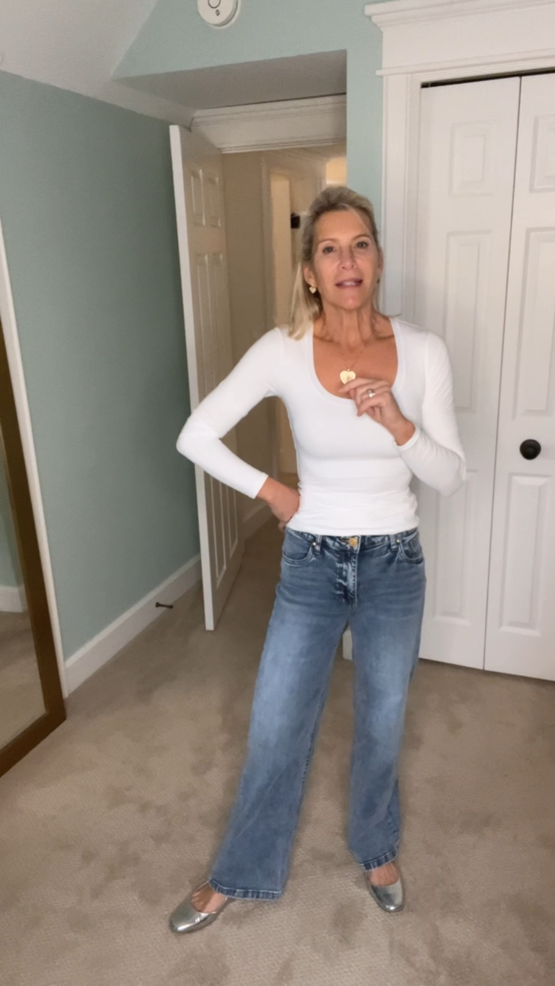 New favorite wide / straight leg jeans.  These are Kut from the Kloth. Size down one or two sizes because they stretch.  Wearing them with a super soft tshirt from Amazon and my new Jane Win heart pendant and let’s not forget my silver flats from Jcrew factory that I wear alllll the time ✅

#LTKOver40 #LTKSaleAlert #LTKFindsUnder50