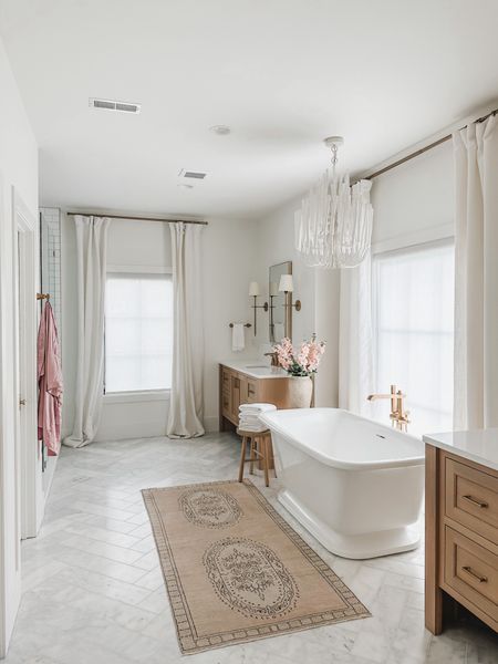 Light and air bathroom with warm wood and pops of pink! 

Primary bathroom, bathroom finds, bathroom decor, lighting, chandelier, sconces, vanity mirrors, faux linen curtains, Amazon finds, wayfair finds, pottery barn finds, vases, brass fixtures, brass plumbing, Target finds, furniture finds, fave finds, shop the look! 

#LTKSeasonal #LTKhome #LTKstyletip