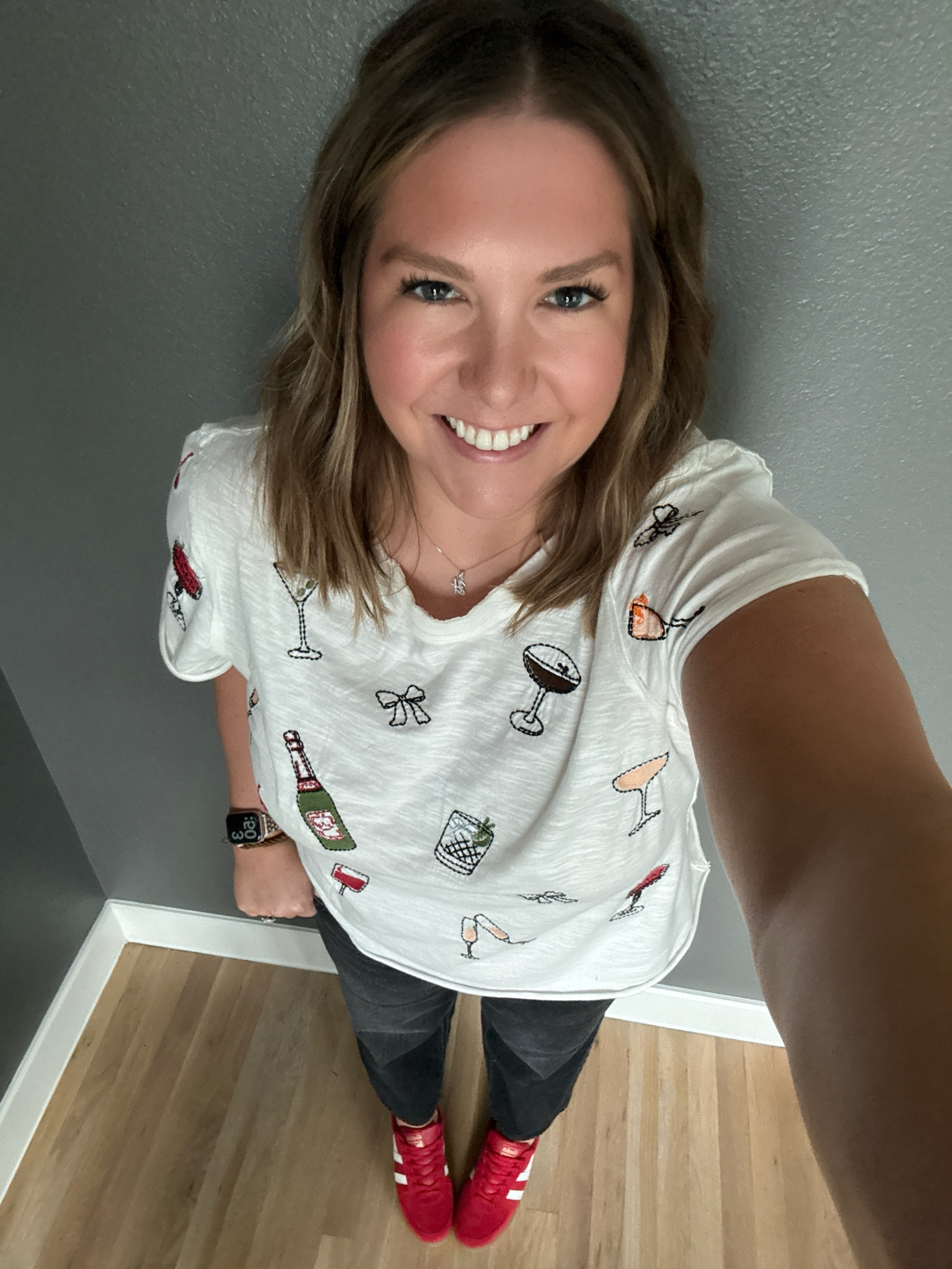 Ready for a fun girls weekend in Palm Springs, CA! This embroidered tshirt is so fun with all the details on it and perfect to wear on a girls trip. I paired it with my favorite black jeans and red sneakers for just a pop of color  