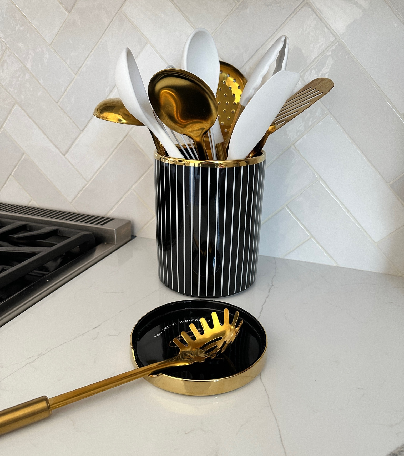 2-in-1 utensil holder and spoon rest, black gold kitchen decor, cooking utensils, gold cooking utensils, white silicone and gold cooking utensils, styled settings, kitchen finds, kitchen accessories

#LTKhome