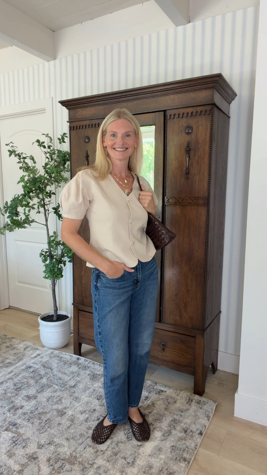 Elevated everyday style. 🤍 This is the kind of outfit I reach for when I’m running errands but still want to feel put together. Classic denim, a feminine knit, and rich brown accessories never go out of style.

#LTKootd #LTKOver40 #LTKdayinmylife