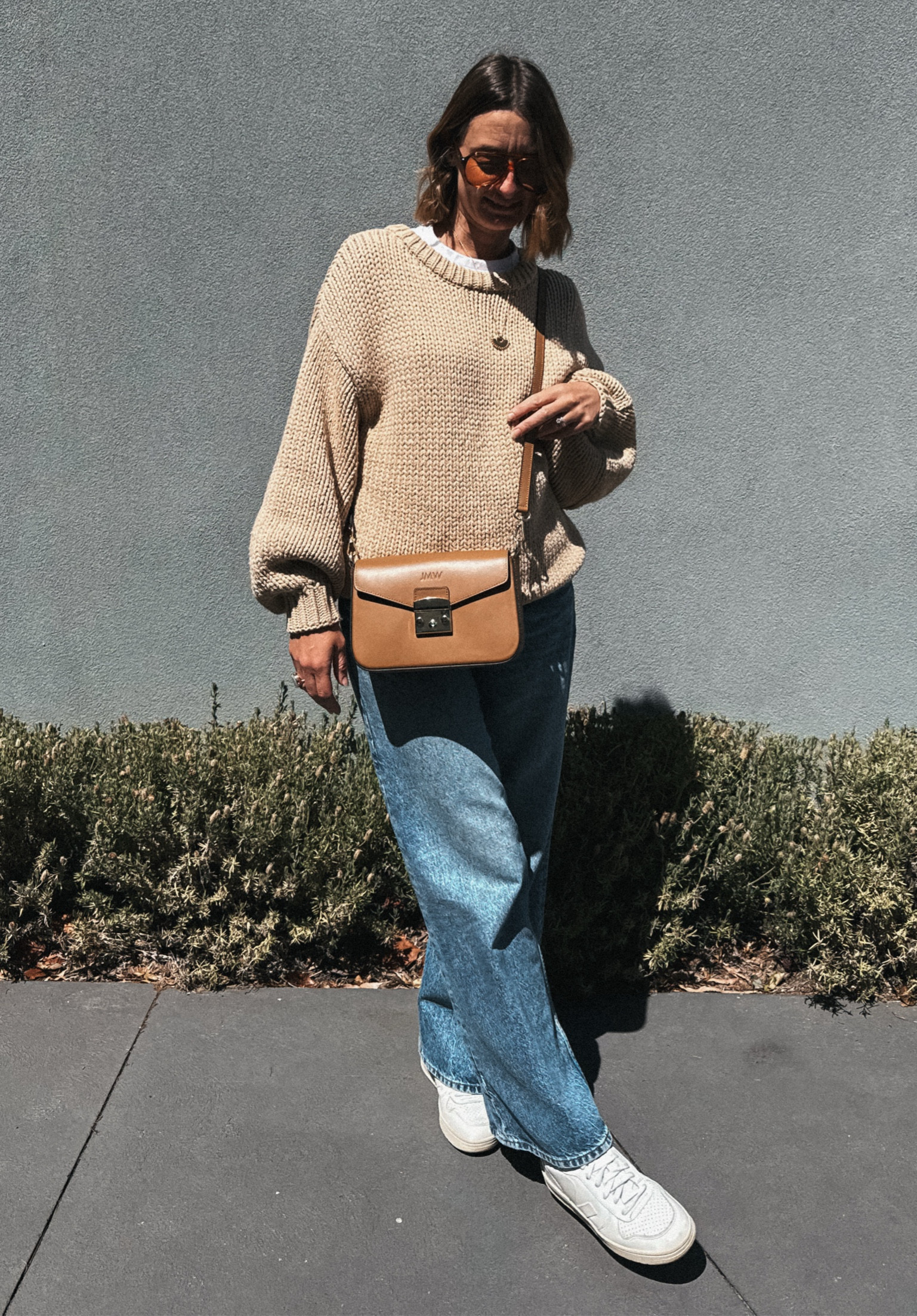 Sweater - Zulu & Zephyr. Bought secondhand wearing a small 
Jeans - Arket Cloud. Wearing my usual size 8, although you could size down if you want a more fitted look 
Sneakers - wearing my usual size EUR 39
Bag - Republic of Florence - Margot crossbody leather bag 
Tee - sized up one size for a more relaxed look   