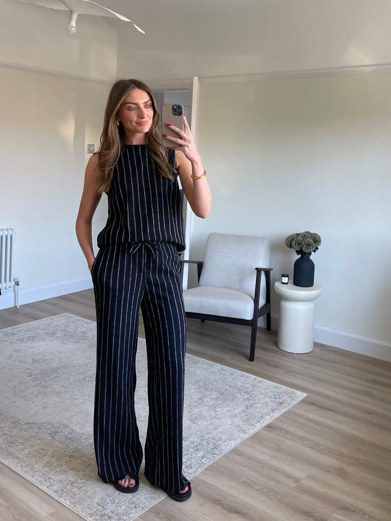 Wearing a 10 in the top
And an 8 in the matching trousers 
I’m 5ft 6 