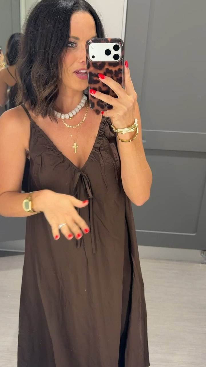 This Target dress is SO good 🤎 The chocolate brown, flowy fit and little tie detail make it feel way more expensive than it is. Such an easy throw-on dress now and the color is perfect heading into fall! Wearing an XS.

#TargetStyle #TargetFinds #TargetFashion #FallStyle #LTKFinds