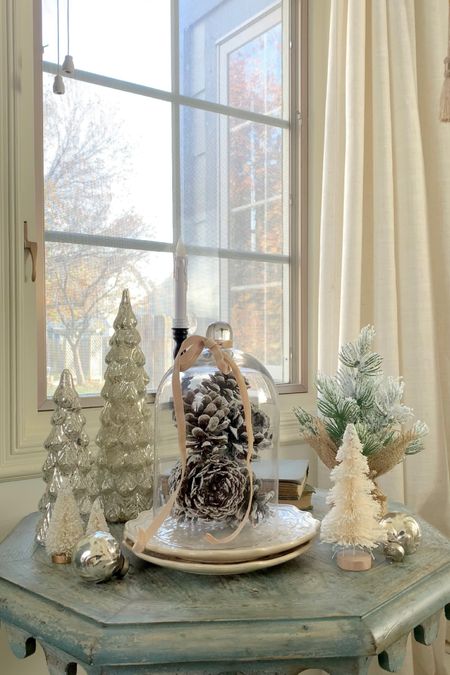 Winter Vignette Essentials:

Bottle Brush Trees
Mercury Glass
Flocked Trees