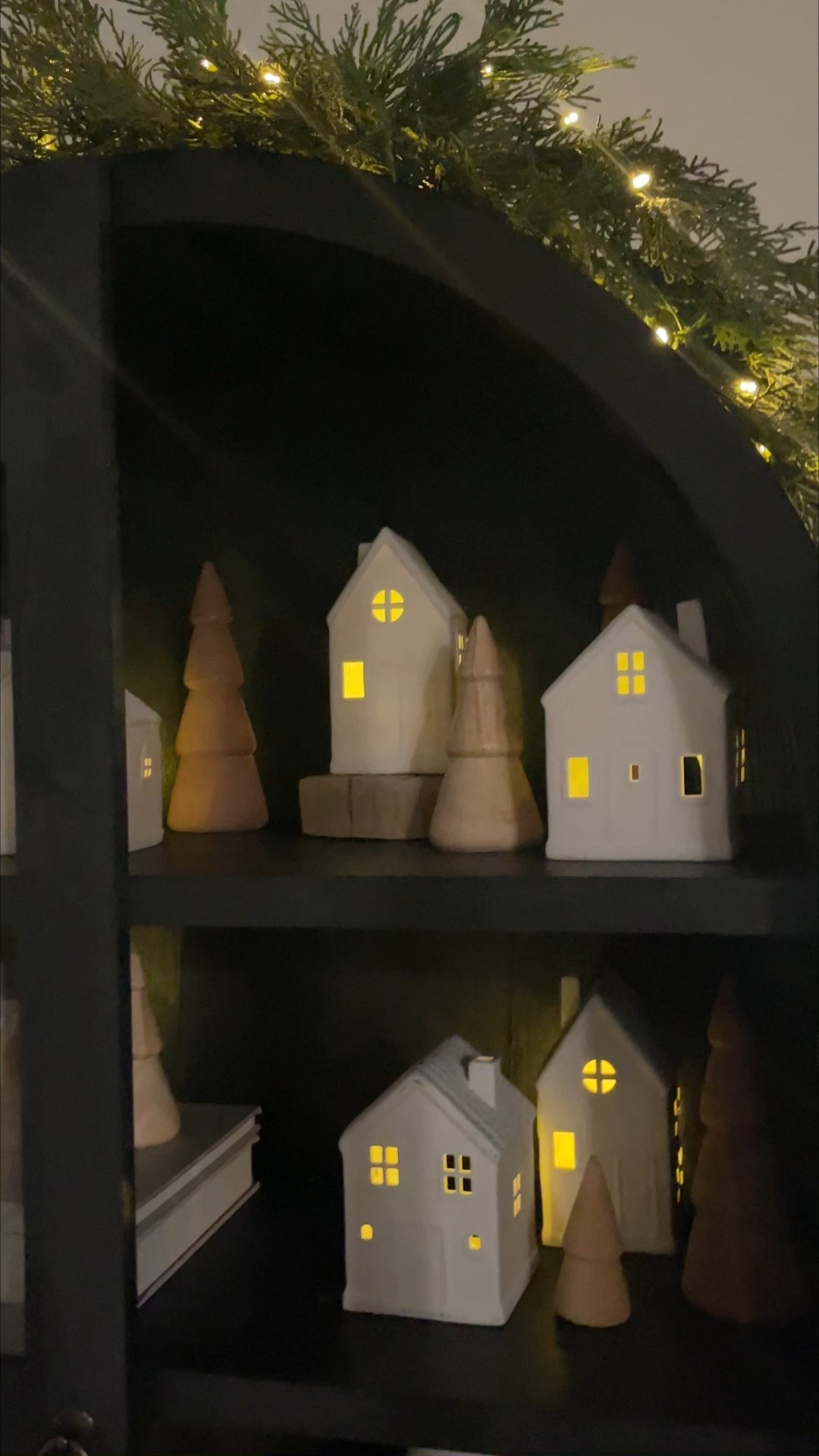After 3 years my Christmas village is back! And I think this black arched cabinet is the best place for all of them. 

I used battery operated tealights with a remote and on a timer so they come on every night! 

#LTKHome #LTKHoliday #LTKSeasonal