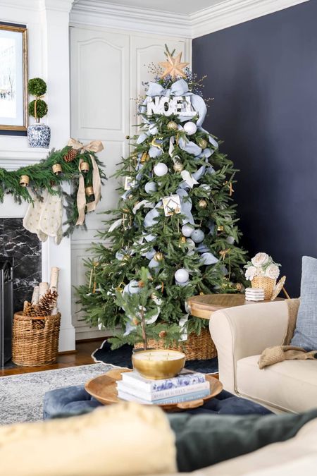 Gold, blue and white Christmas tree, artificial Christmas tree, tree collar, blue living room, living room Christmas decor, mantel garland, blue ottoman, linen pillows, pottery barn sectional

#LTKSeasonal #LTKHoliday #LTKhome