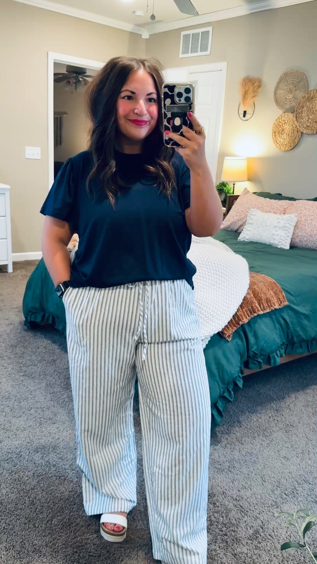 Striped pants are my favorite way to welcome spring 🌷🤍 Light, breezy, and such an easy way to add a little pattern to your everyday look. Pair with a simple tee or lightweight sweater and you’re set.

sandals: fit true to size // wearing a 5
pants: fit true to size // wearing an XL (I got the color “white black stripe, but it looks more navy to me)
ruffle sleeve tee: fits true to size // wearing an XL (SO SOFT) 

 

#LTKootd #LTKMidsize #LTKWorkwear