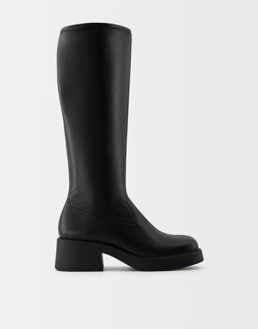 Bershka flat fitted boots in black | ASOS (Global)