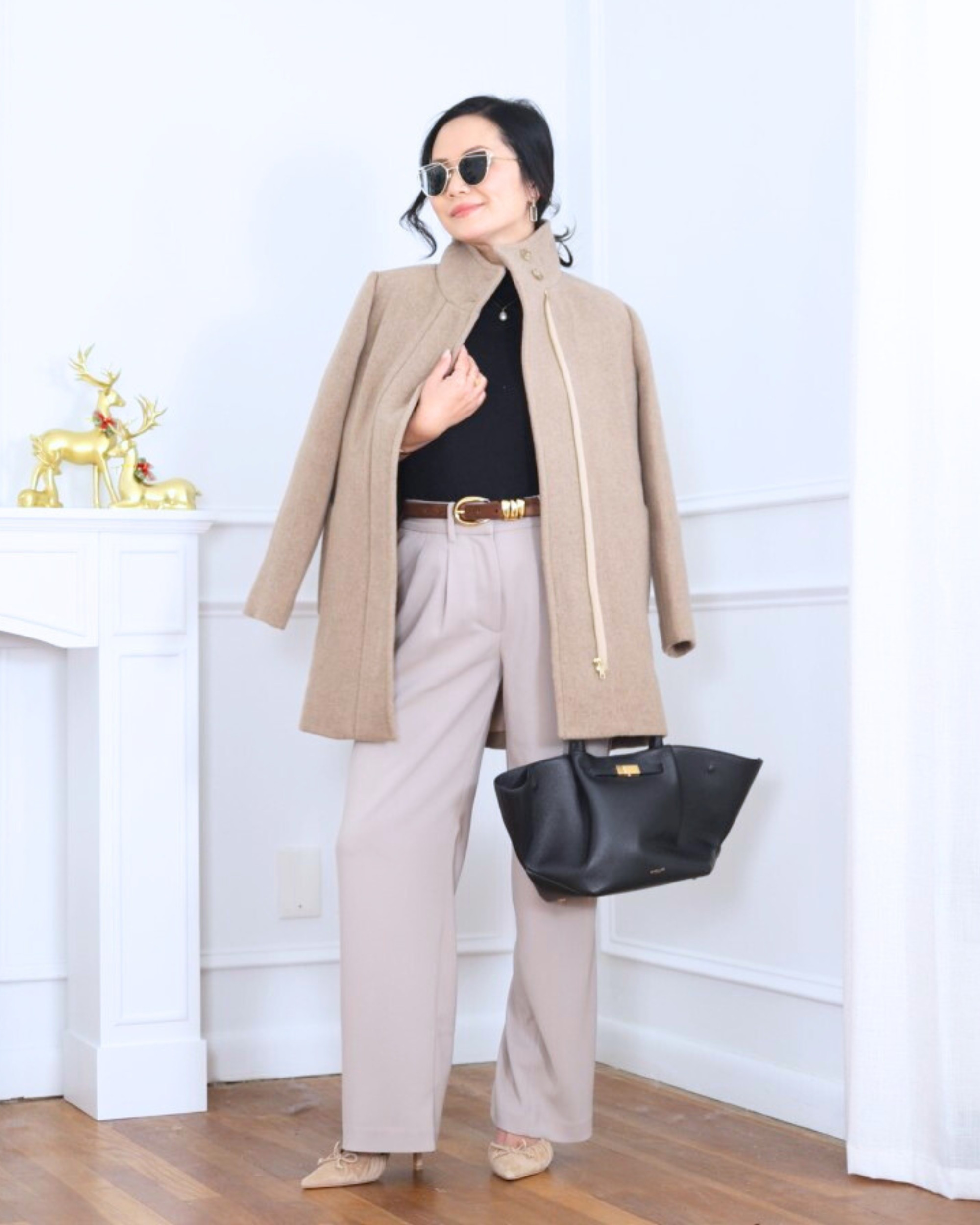 Classic with a modern touch — a petite city coat from J.Crew Factory layered over a black turtleneck, paired with pleated wide-leg pants from Quince. Clean, polished, and effortless for cool days when you want to feel put together without trying too hard. I’m 5’2, wearing size XS.

#LTKootd #LTKPetite #LTKOver40
