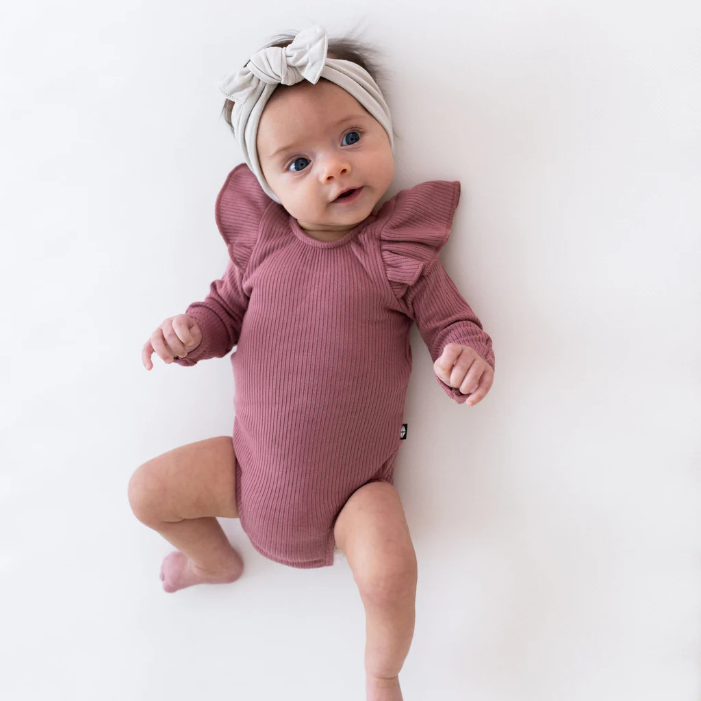 Ribbed Long Sleeve Ruffle Leotard in Dusty Rose | Kyte BABY