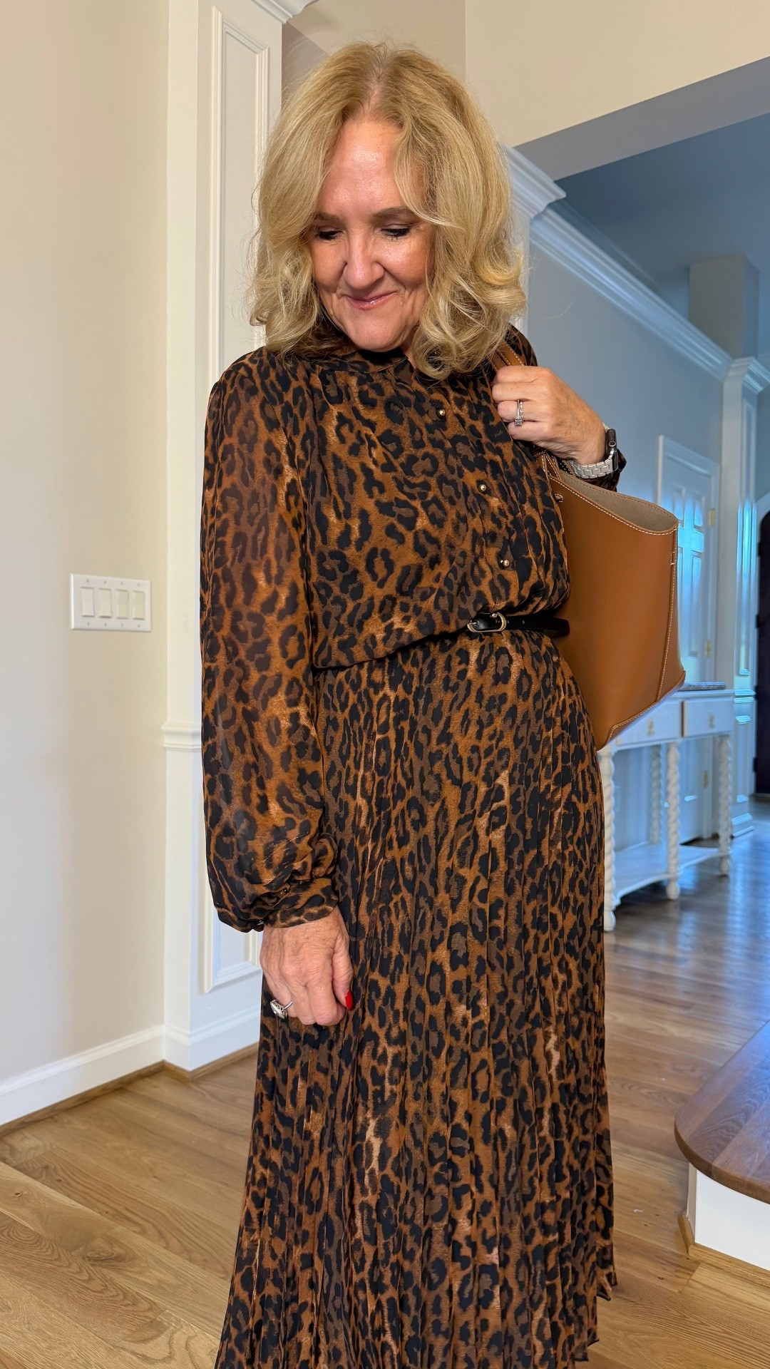 Leopard always makes a bit of a statement, doesn’t it? I’m wearing a medium/8, and I really like how the pleated skirt gives this dress such a flattering shape.