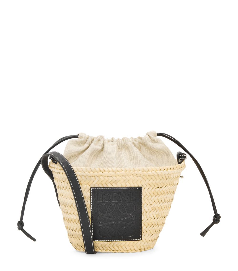 x Paula's Ibiza Woven Drawstring Bucket Bag | Harrods