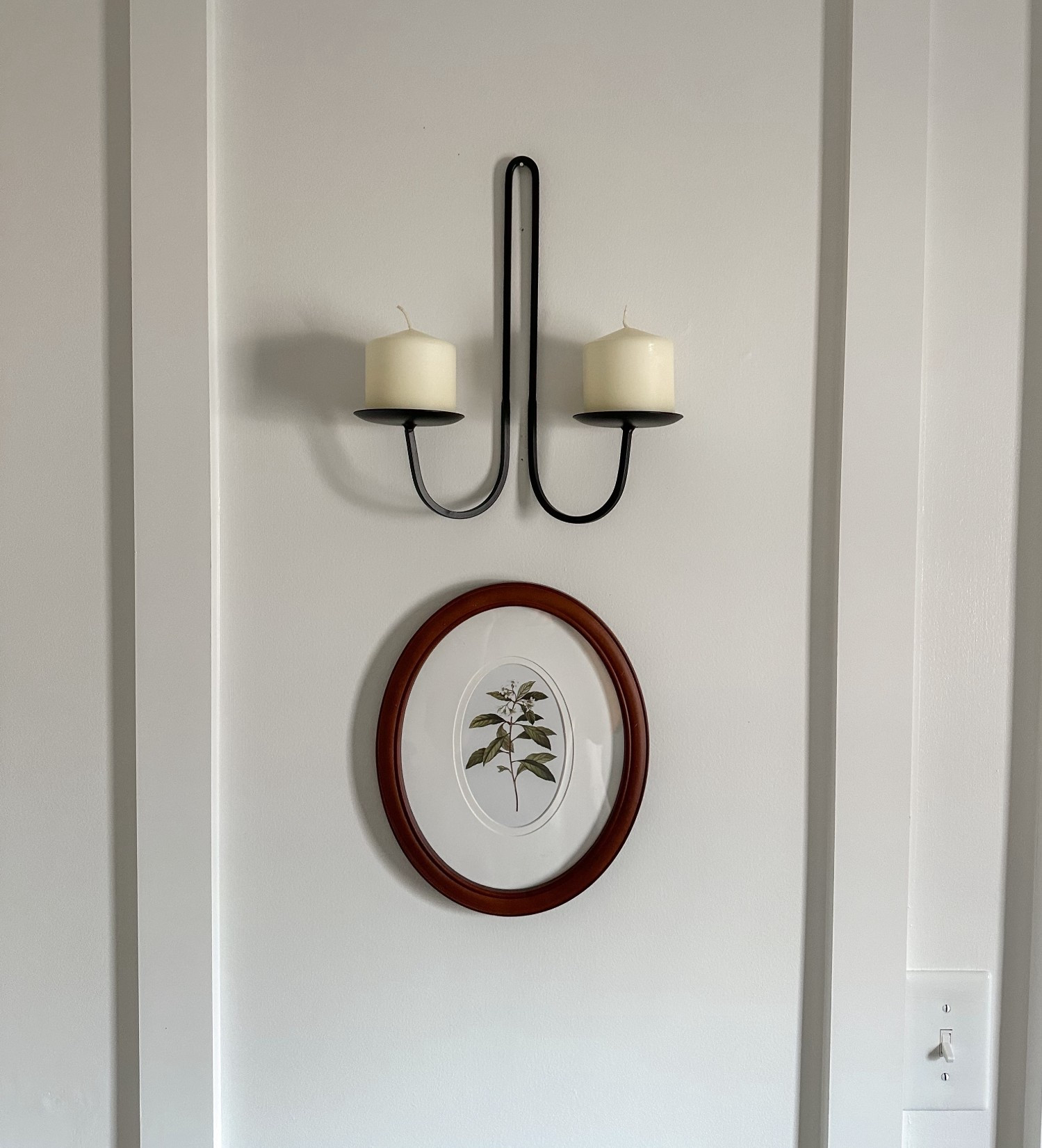 Working on a little entryway refresh and found these affordable candle sconces that work perfectly here! 

#LTKHome