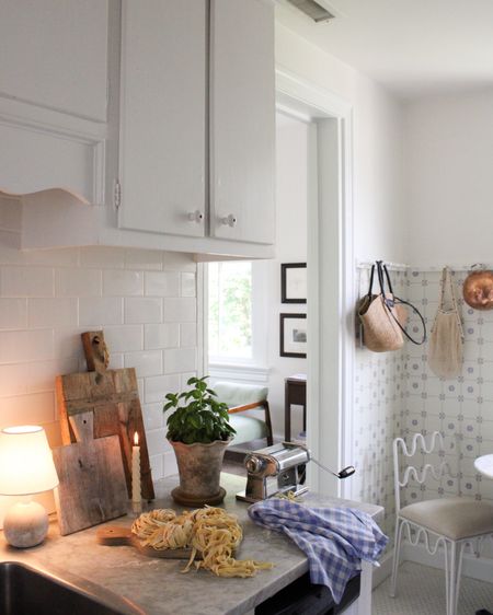 Kitchen essentials // cutting board, check dishtowels, tiny light, pasta maker

#LTKHome