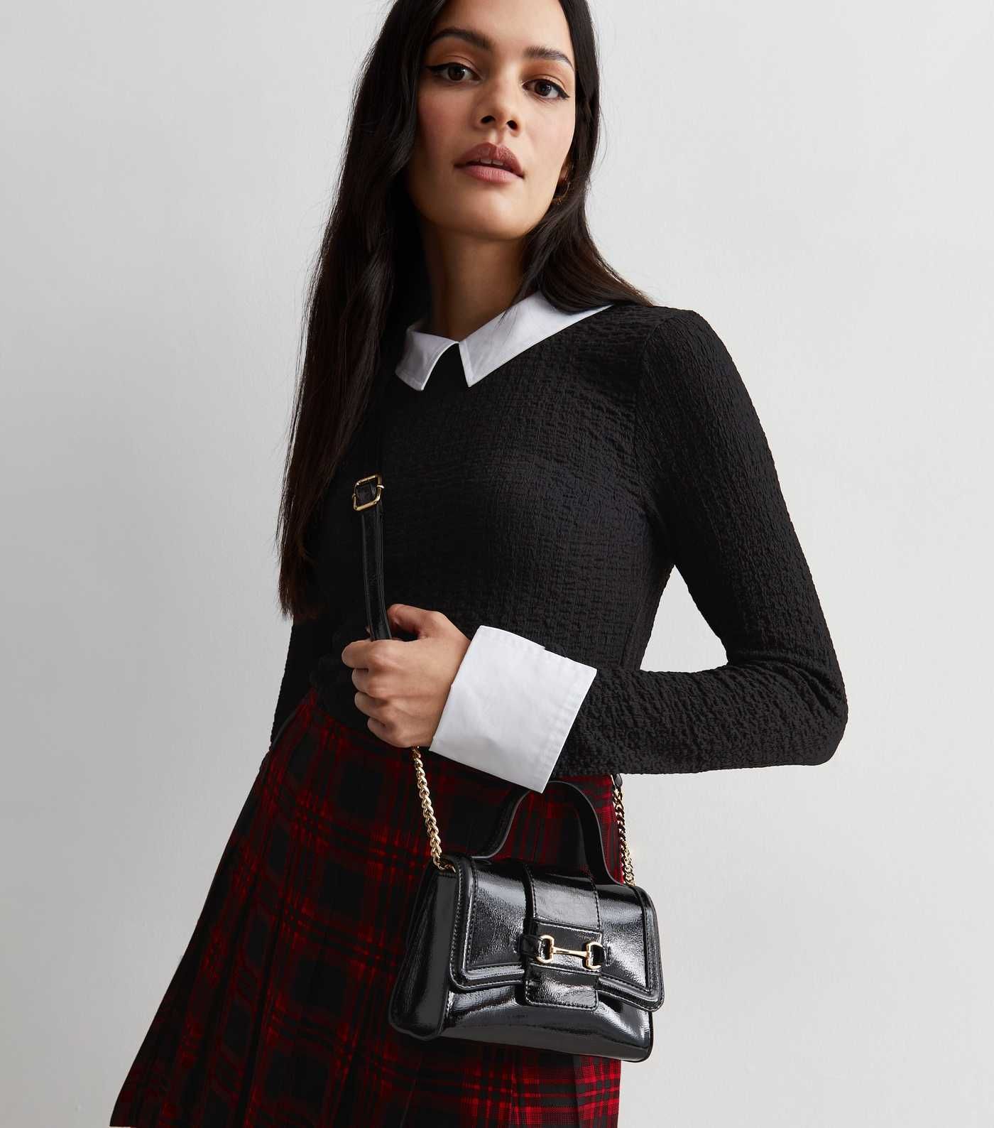 Black Patent Snaffle Cross Body Bag
						
						Add to Saved Items
						Remove from Saved Items | New Look (UK)