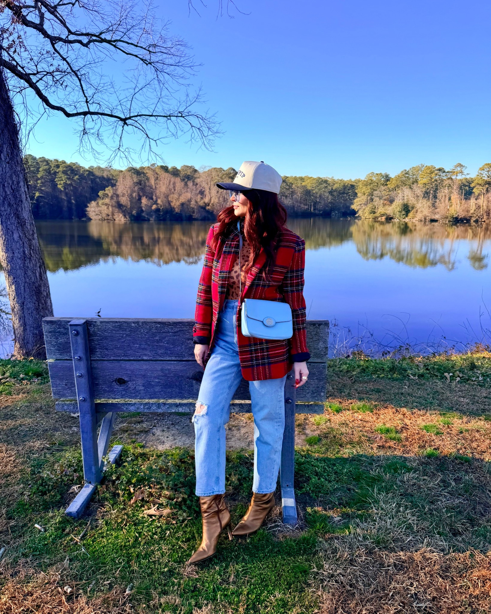 Obsessed with this cozy-meets-cool  look 🍂 Plaid layers, a pop of leopard, and my go-to denim make this outfit perfect for crisp sunshine days and casual exploring. And let’s talk about these boots — they instantly elevate the whole vibe.

Boots are @inez— useand code brandi15 for 15% off. ✨
Hat @gigipip
Blazer @vici

