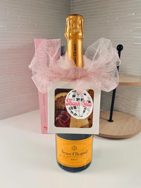 I found this small business on Tiktok and I am OBSESSED!! ParksPartyPlanning makes these wine bottle box gift tags and fills them with the cutest items to celebrate every occassion. She even has a holiday set out! Support her amazing work!! (This picture is from her Etsy shop) 

#LTKunder50 #LTKfamily #LTKHoliday