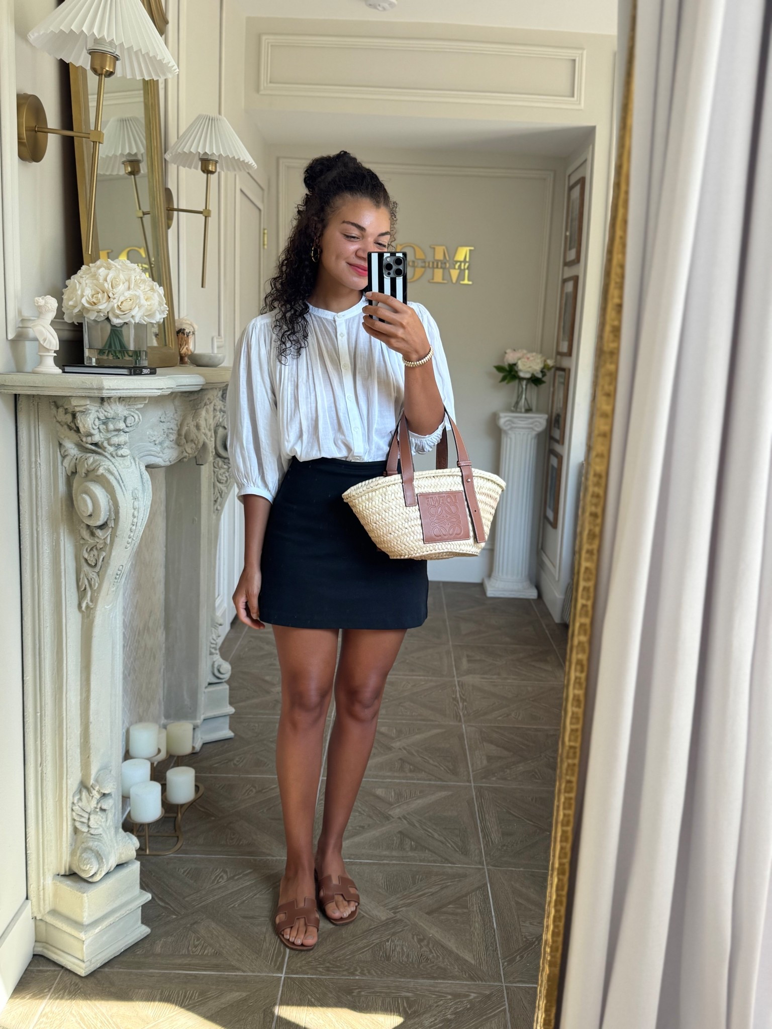 Classic summer outfit for going out to lunch: white blouse, mini skirt, sandals, and a straw bag (white top is sheer by the way!)

#LTKStyleTip #LTKFindsUnder100 #LTKSeasonal