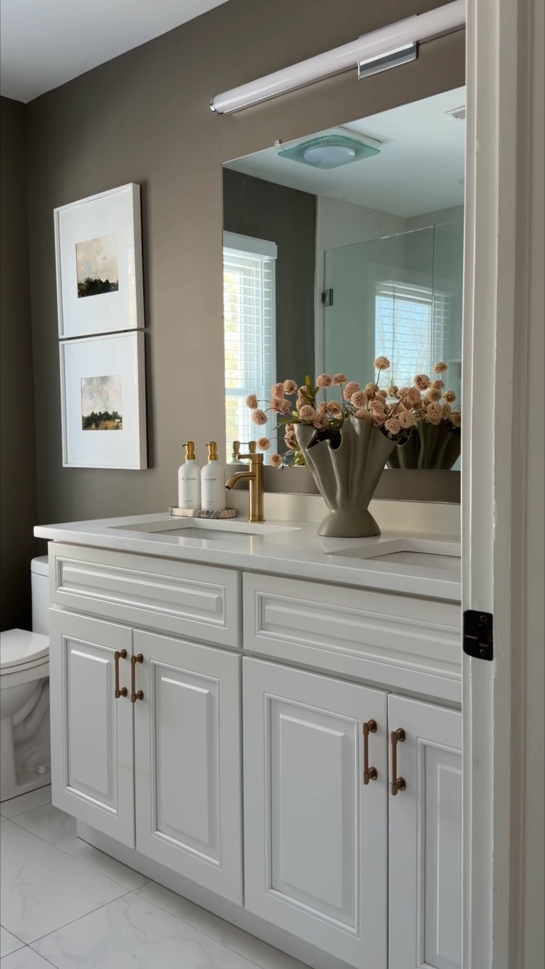 Builder-grade → elevated ✨ #ad We gave our guest bath a major glow-up without a full renovation, with just a few smart swaps from Glacier Bay, available exclusively at The @homedepot 
Designer-inspired style that’s durable, affordable, and easy to install yourself so you can make a big impact without spending thousands. We used the Ryden Collection Faucets in Brushed Gold and hardware from the Dorind Collection to finish the look. 
If you’ve been wanting to refresh your bathroom, now’s the time to shop Glacier Bay during The Home Depot Winter Bath Event! Save up to 40% off select online bath now through 3/27/26. #TheHomeDepotPartner #SmallProjectsBigImpact #GlacierBay

#LTKSaleAlert #LTKdayinmylife #LTKHome