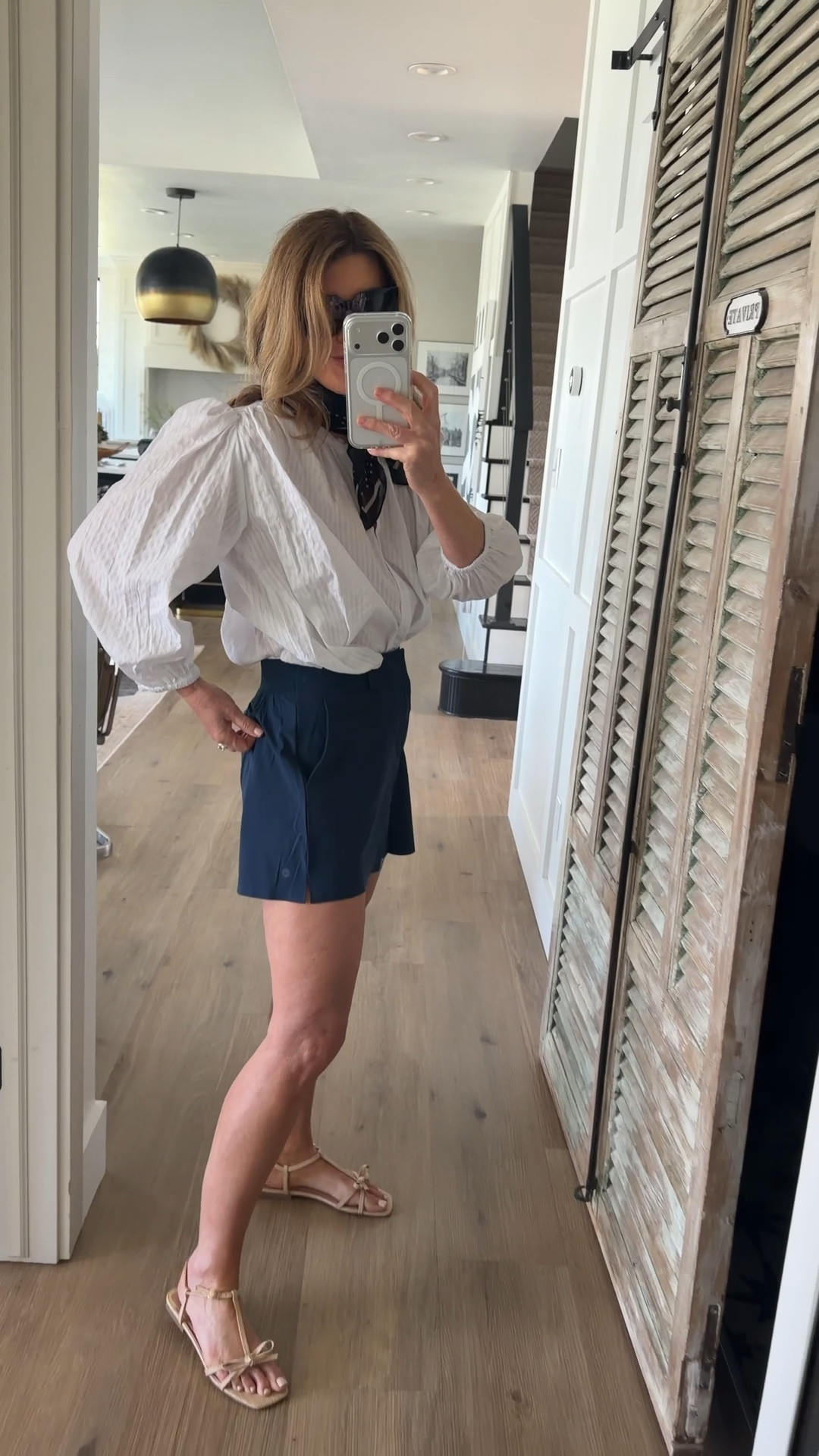 These gold shorts are a favorite of mine. I have in 2 colors! I’m in a size small. The long sleeve white cotton button down is the perfect summer blouse. I’m in a small. I added this versatile scarf and neutral shoe all #walmartstyle 

#LTKOver40