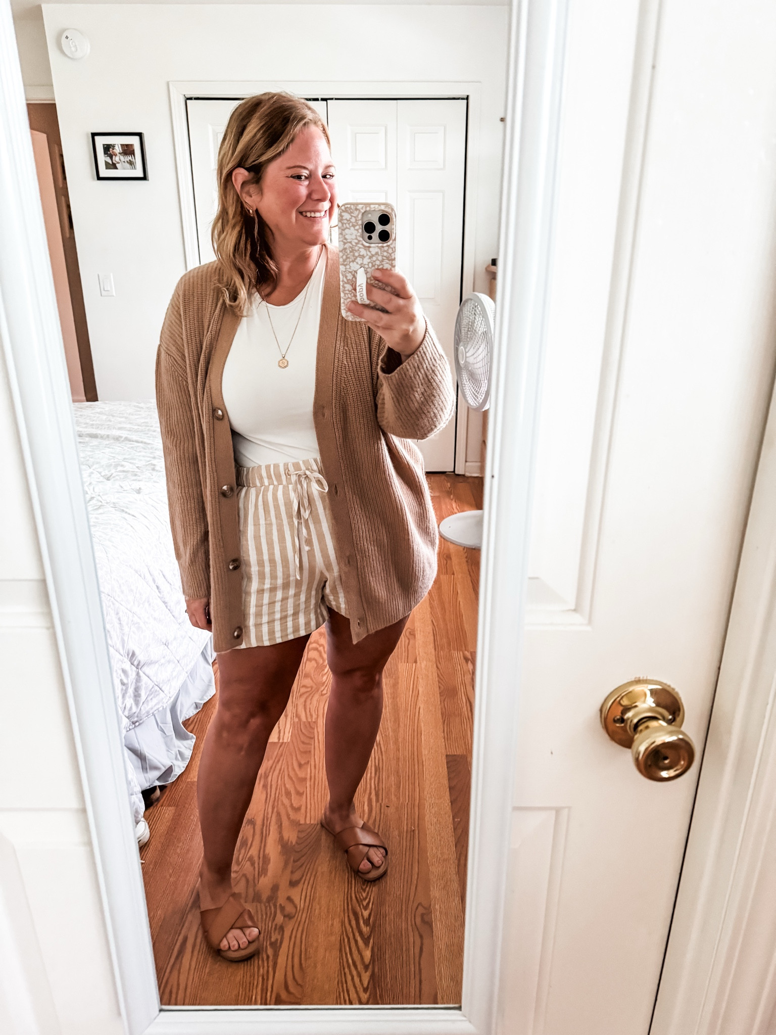 Wearing a large in my quince cashmere cardigan and an XL in my tank.  My shorts are old so linked similar 

#LTKMidsize #LTKmomlife #LTKSeasonal