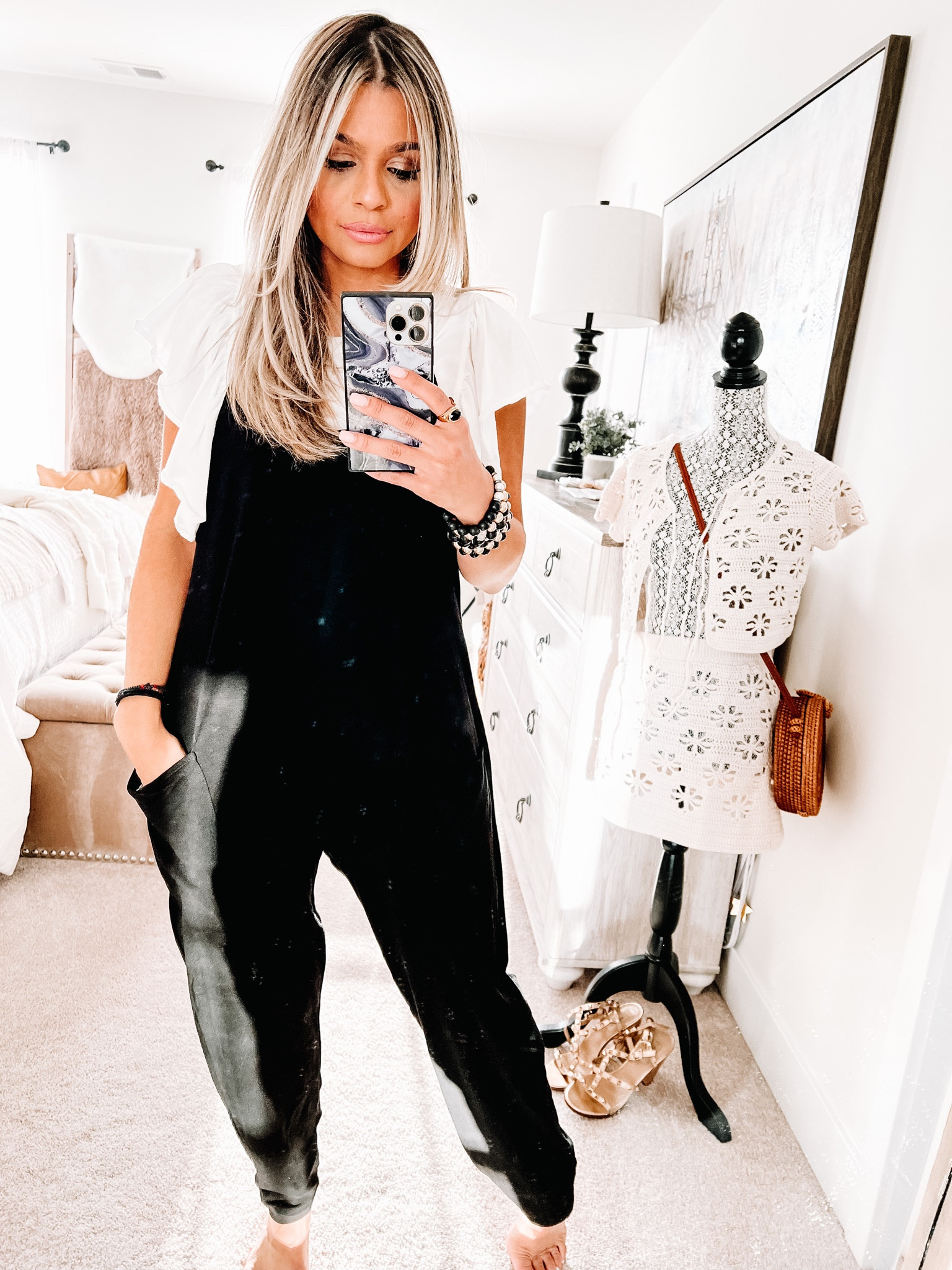 Here is the jumpsuit paired with a white ruffle tee shirt for a more casual look! 

#LTKstyletip #LTKworkwear #LTKshoecrush