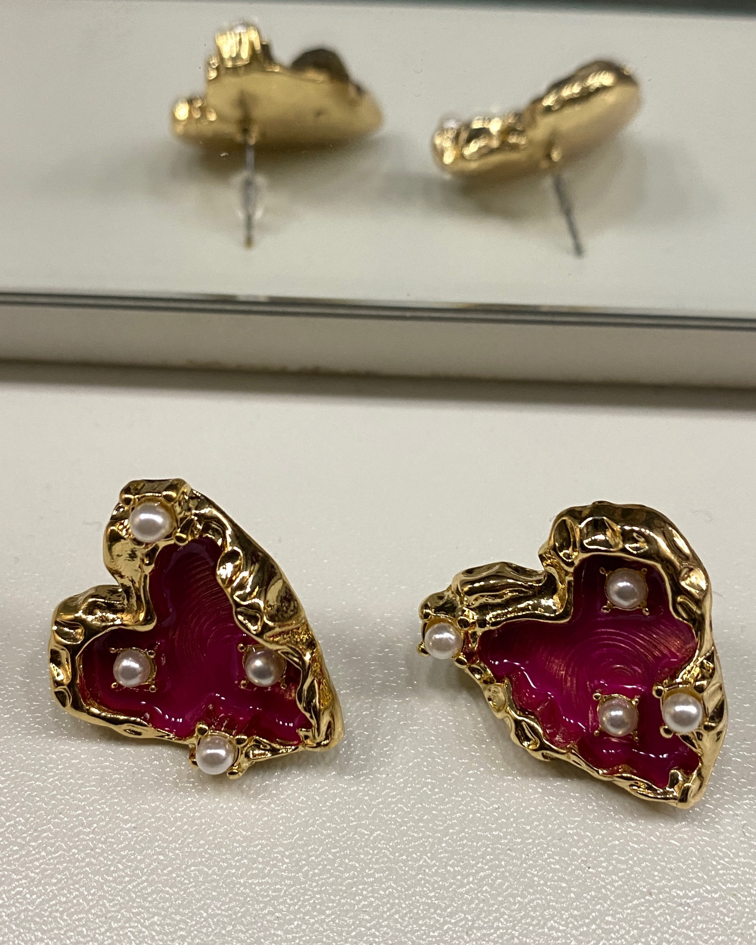 Pink heart earrings 

#LTKBeauty #LTKStyleTip #LTKFindsUnder50