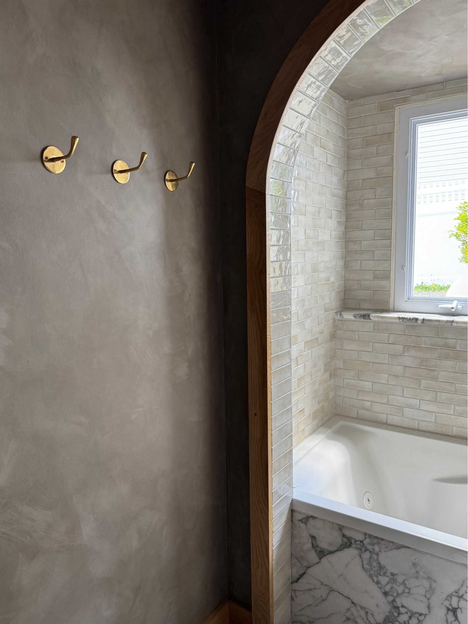 Unlaquered brass towel hooks #bathroom

#LTKhome