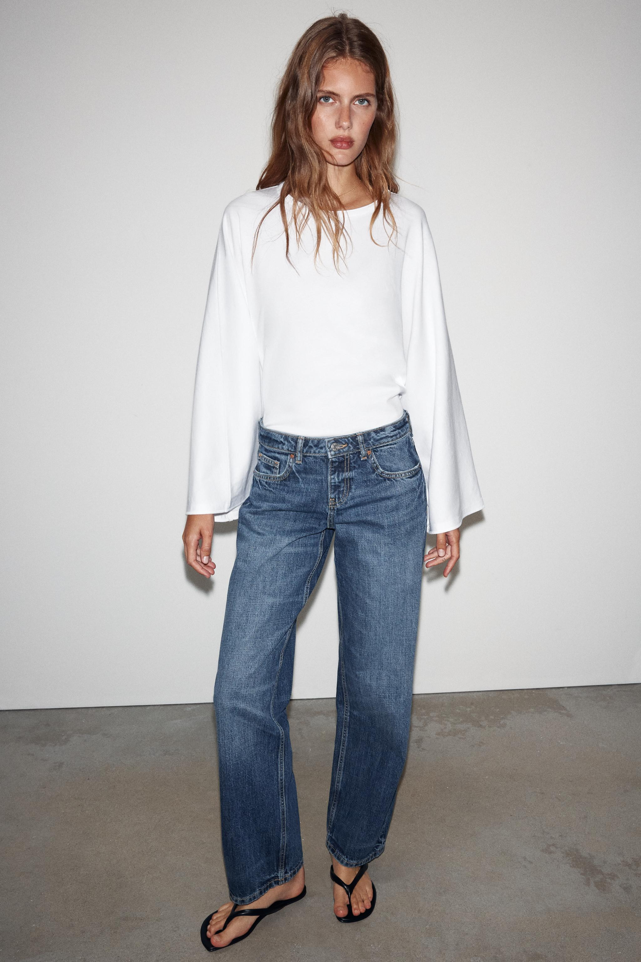 LOW-RISE - REGULAR LEG - RIGIDLow-rise jeans with a five-pocket design. Regular leg. Front zip fl... | Zara UK