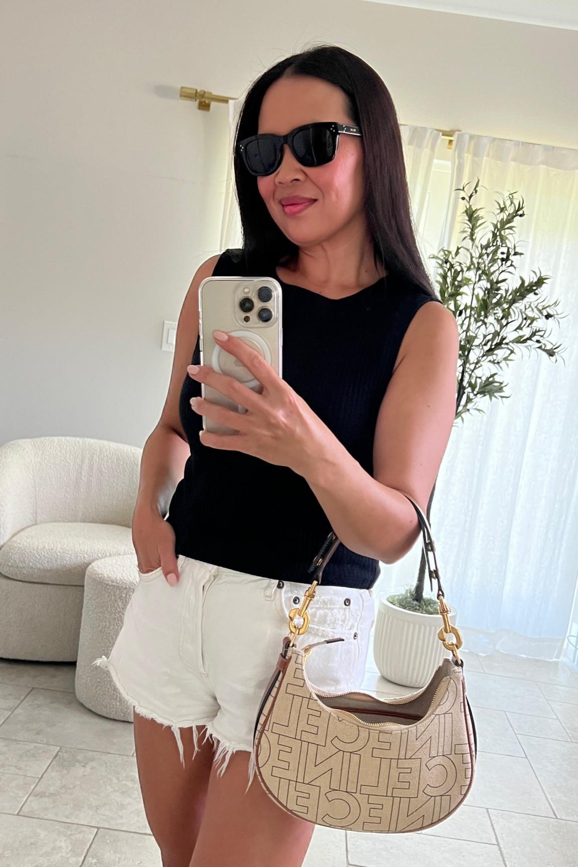Weekend uniform

Reformation Daxton Tank (medium)
Agolde Parker Shorts (size 26)
Celine 3 Dots Sunglasses
YSL rouge volupte 150
Celine Ava Bag