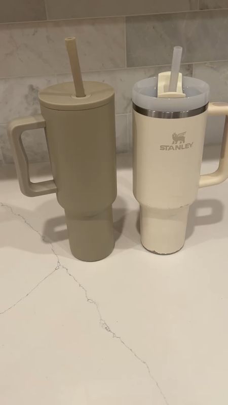 Amazon tumbler vs Stanley tumbler side by side. Both hold 40oz (really 20 with ice) and keep ice cold the same. I alternate the two but reach for my amazon one more bc it doesn’t leak as bad. It will eventually come out of the straw if it’s full or turned upside down but the Stanley leaks immediately so I feel like I’m constantly cleaning up spills with the kids  

#LTKhome #LTKfindsunder50 #LTKxPrime